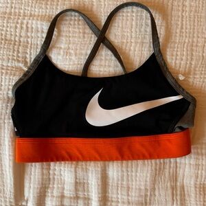 Nike black and orange elastic sports bra